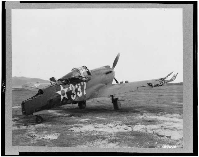 A wrecked P-40 at Bellows Field following the bombing on 7 Dec 1941