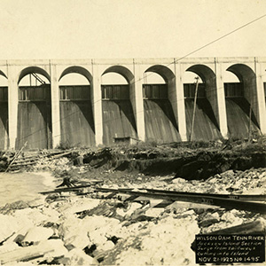Curved archways in a row on a dam's spillway