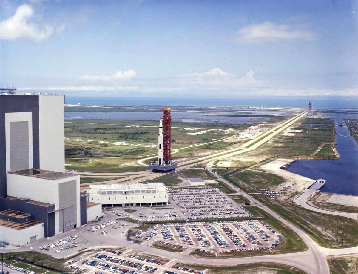 view of vehicle assembly building, crawlerway, and canal