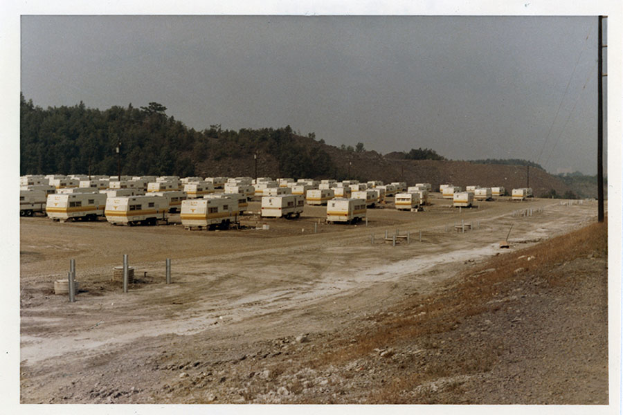 Rows of trailer homes in a field